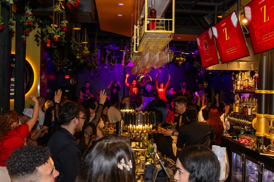 The room full at Beyond the Sun, with the live band on stage.